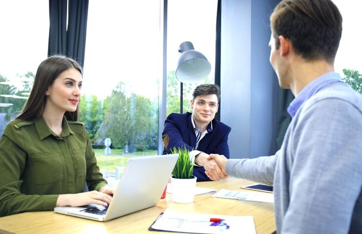 Client meeting with professional limited company accountants to review year-end accounts