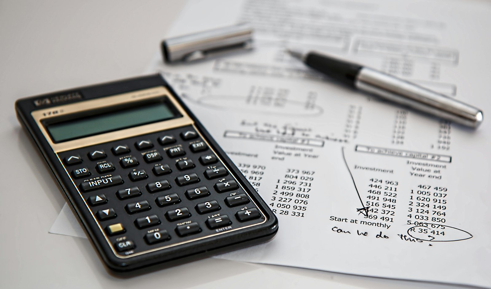 calculator with pages and pen