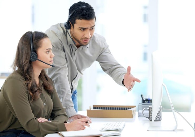 Business team providing accounting support via headset
