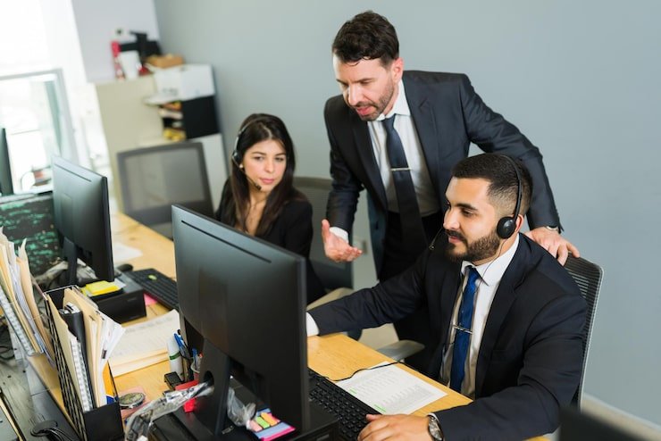 male supervisor training latin executive call center manager explaining work stuff employees offering tech support customer